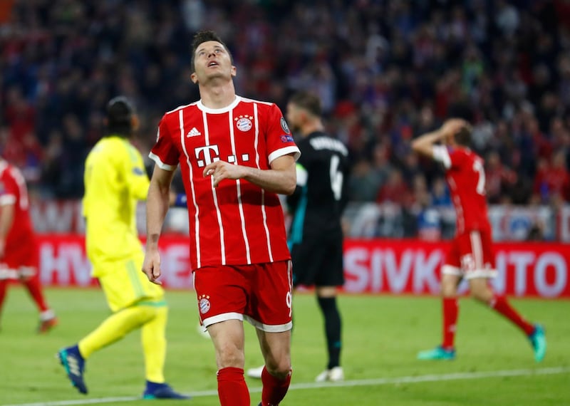 Bayern's Robert Lewandowski reacts after failing to score during the semifinal first leg soccer match between FC Bayern Munich and Real Madrid at the Allianz Arena stadium in Munich, Germany, Wednesday, April 25, 2018. (AP Photo/Matthias Schrader)