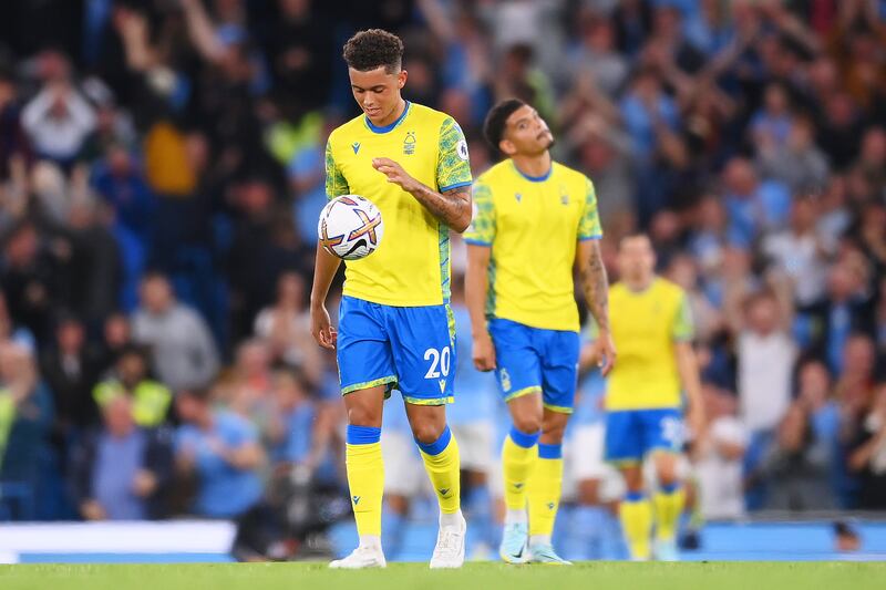 Dejected Nottingham Forest players after City's third goal. Getty