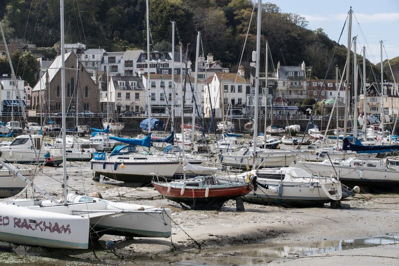 ST HELIER, JERSEY - APRIL 13:  Boats are seen at low tide in the harbour in St Aubin on April 13, 2017 near St Helier, Jersey. Jersey, which is not a member of the European Union, is one of the top worldwide offshore financial centres, described by some as a tax haven, as it attracts deposits from customers outside of the island who seek the advantages of reduced tax burdens. In 2008 Jersey's gross national income per capita was among the highest in the world. However, its taxation laws have been widely criticised by various people and groups including the EU. As the UK negotiates its exit from the EU having triggered Article 50, concerns have been raised as to how this will affect the future of the financial industry on the island especially as The chancellor, Philip Hammond has claimed Britain could also become a corporate tax haven if the EU fails to provide it with an agreement on financial market access after Brexit.  (Photo by Matt Cardy/Getty Images)