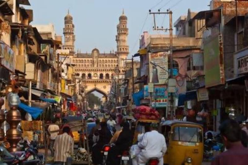 The busy thoroughfare of Laad Bazaar with the minarets of Charminar, the city's most famous monument, visible behind. Lonely Planet Images / Getty Images
