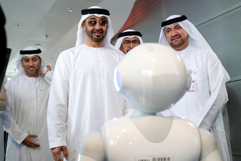 AL AIN, ABU DHABI, UNITED ARAB EMIRATES - February 07, 2019: HH Sheikh Mohamed bin Zayed Al Nahyan, Crown Prince of Abu Dhabi and Deputy Supreme Commander of the UAE Armed Forces (C), looks at a robots, during a visit to the United Arab Emirates University. Seen with Mohamed Abdulla Al Baili, Vice Chancellor of the United Arab Emirates UAE University (UAEU) (R) and HE Dr Ahmed Abdullah Humaid Belhoul Al Falasi, UAE Minister of State for Higher Education (L).
( Ryan Carter for the Ministry of Presidential Affairs )
---