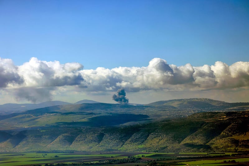 Smoke billows across the horizon along the hills in southern Lebanon following Israeli bombardment from a position along the border in northern Israel.  AFP