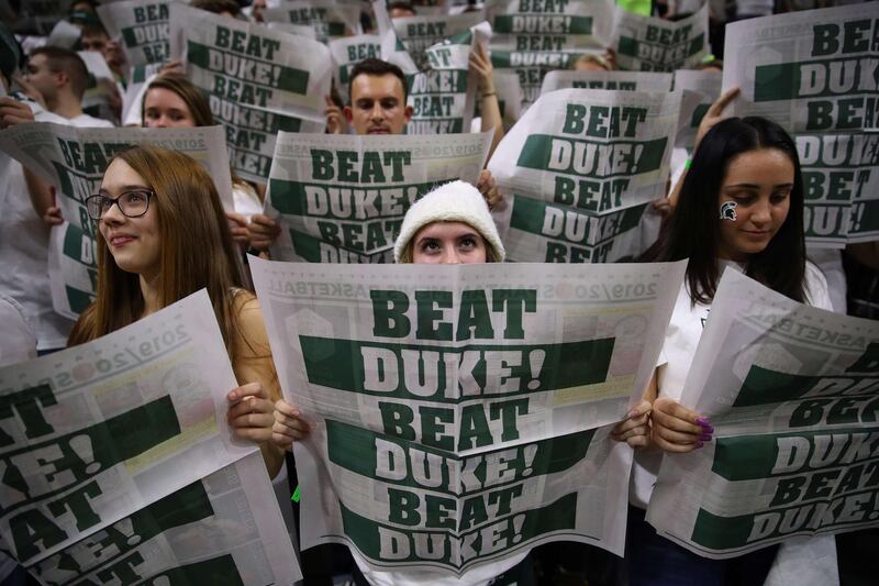 Michigan State Spartans fans ahead of their college basketball match at home to the Duke Blue Devils on Tuesday, December 3. Duke won won the game 87-75. AFP