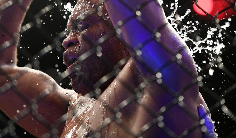 Anderson Silva pours water on his face after his middleweight bout against Israel Adesanya at the UFC 234 event in Melbourne, Australia. AP Photo