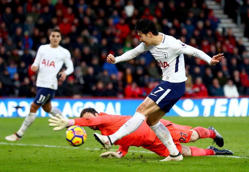 BOURNEMOUTH, ENGLAND - MARCH 11: Heung-Min Son of Tottenham Hotspur scores his sides third goal past Asmir Begovic of AFC Bournemouth during the Premier League match between AFC Bournemouth and Tottenham Hotspur at Vitality Stadium on March 11, 2018 in Bournemouth, England.  (Photo by Clive Rose/Getty Images)