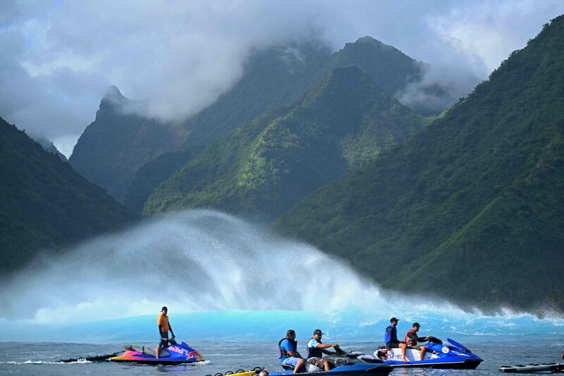 People take jet skis on to the water in Teahupo'o, on the French Polynesian island of Tahiti, which will host the surfing events of the Paris 2024 Olympics. AFP