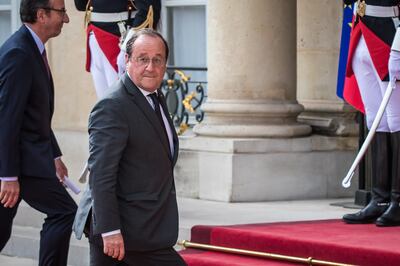 French former president Francois Hollande arrives at the Elysee Palace. EPA