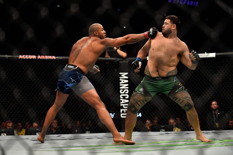 Tai Tuivasa evades a punch from Ciryl Gane during their UFC heavyweight fight in Paris. AFP