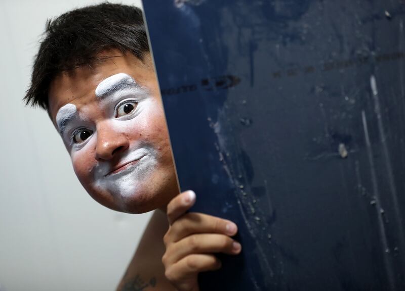 Photo project. A performer with Fontana, a travelling water circus produced by Cirque Du Liban, prepares for a show at  Festival City, Dubai. Chris Whiteoak / The National