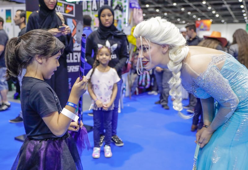 Dubai, April 12, 2019.  MEFCC day 2-A fan greets Makenzie Landeros who is dressed as the charachter, Elsa.Victor Besa/The National.Section:  AC  Reporter:  Chris Newbould
