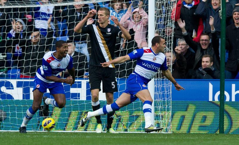 Reading's Hal Robson-Kanu, right, celebrates after scoring against Fulham during their English Premier League soccer match at the Madjeski stadium, in Reading, England, Saturday, Oct. 27, 2012. (AP Photo/Tom Hevezi)  *** Local Caption ***  Britain Soccer Premier League.JPEG-05468.jpg