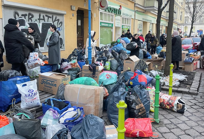 Turkish residents of Berlin, with one the world's largest communities outside of Turkey, collect bags and boxes with warm clothes and other goods for a Turkish nursing service. Reuters