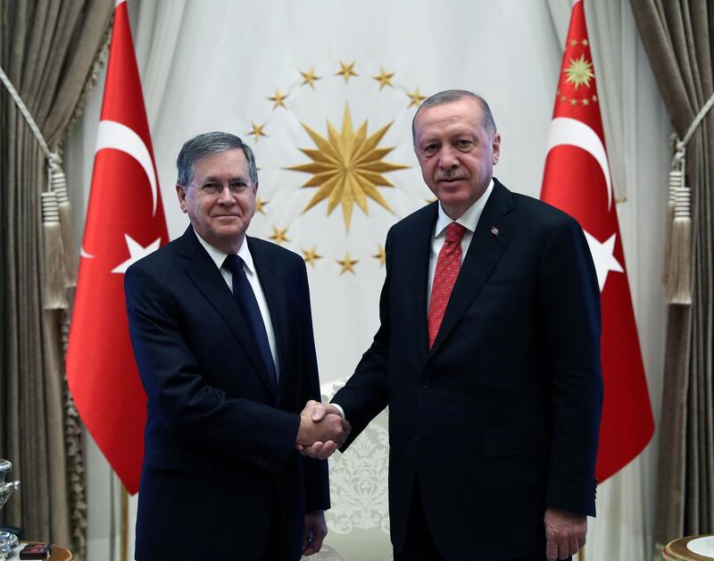 Turkish President Tayyip Erdogan shakes hands with U.S. Ambassador to Turkey David M. Satterfield during a ceremony to receive credentials from newly appointed foreign ambassadors to Turkey at the Presidential Palace in Ankara, Turkey, August 28, 2019. Cem Oksuz/Presidential Press Office/Handout via REUTERS ATTENTION EDITORS - THIS PICTURE WAS PROVIDED BY A THIRD PARTY. NO RESALES. NO ARCHIVE