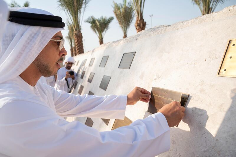 MAHWI, ABU DHABI, UNITED ARAB EMIRATES - September 04, 2019: HH Sheikh Mansour bin Zayed Al Nahyan, UAE Deputy Prime Minister and Minister of Presidential Affairs, places a memorial plaque during the inauguration of the Presidential Guard Martyrs Park, at Mahwi Military Camp.

( Hamad Al Kaabi / Ministry of Presidential Affairs )​
---