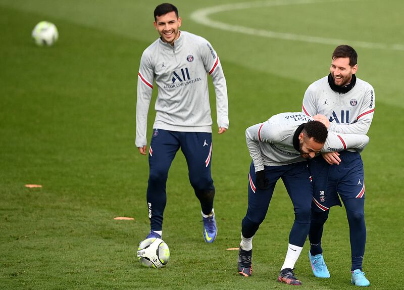 Neymar jokes around with Lionel Messi during training on Thursday, February 10, 2022, ahead of Paris Saint-Germain's Ligue 1 game at home to Rennes. AFP
