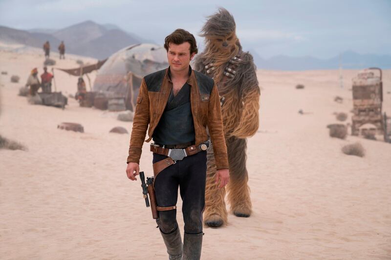 In this image released by Lucasfilm, Alden Ehrenreich and Joonas Suotamo appear in a scene from "Solo: A Star Wars Story," which will premiere at the Cannes Film festival in southern France. (Jonathan Olley/Lucasfilm via AP)