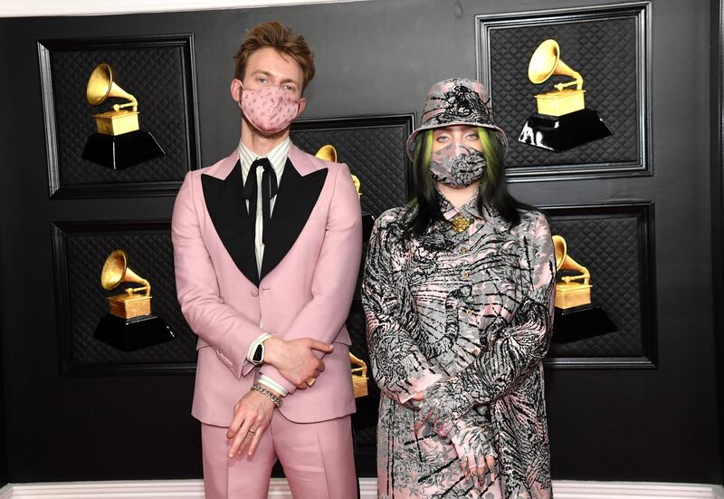 Siblings Finneas Baird O'Connell (L) and Billie Eilish arrive on the red carpet. EPA