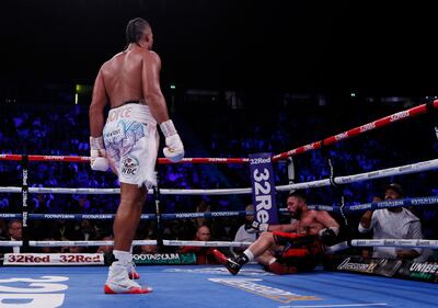 Joe Joyce sends Joseph Parker to the canvas in the 11th round to claim the stoppage win. Reuters