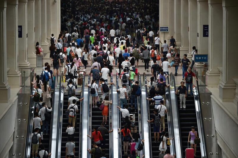 Passengers crowd a railway station on the first day of the Chinese mid-autumn festival holiday in Wuhan, Hubei province, China, on September 15, 2016. Reuters