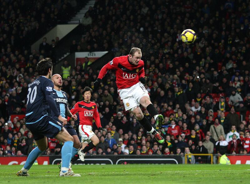 Manchester United's Wayne Rooney scores his side's second goal against West Ham on February 23, 2010. PA