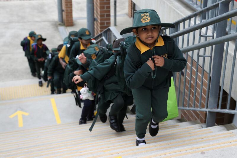 Children return to campus for the first day as New South Wales public schools fully reopen amid the easing of the coronavirus restrictions at Homebush West Public School in Sydney, Australia. Reuters