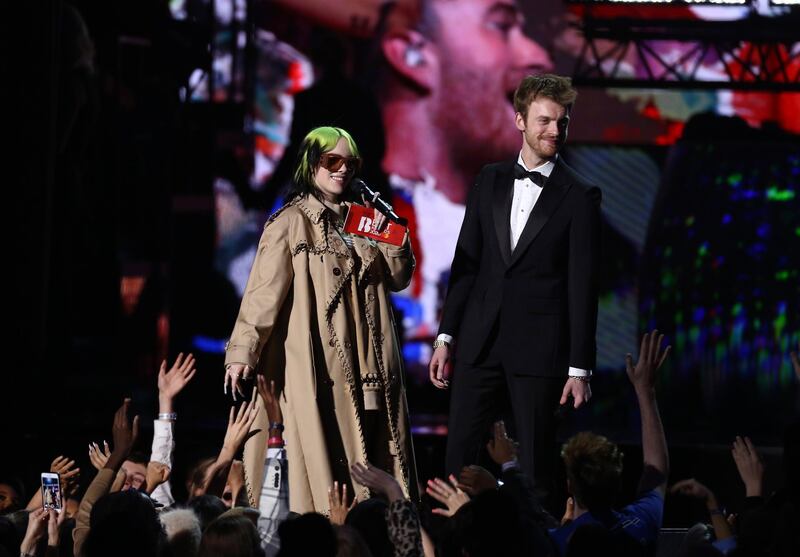 Billie Eilish and Finneas O'Connell on stage at the Brit Awards 2020. AP