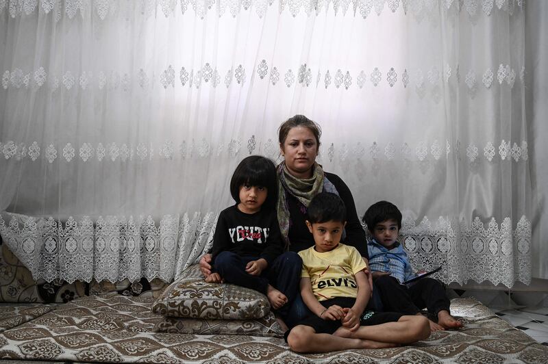 Fatima Ibrahim, in her early 30s, married a Syrian refugee after fleeing to Turkey nine years ago. The economic fallout is hitting them equally as hard as the Turks, she said. 'Employers pay us less, so locals are annoyed, blaming us for accepting a wage less than theirs,' she said, sitting next to her three young sons.
