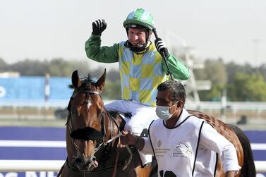 Secret Ambition, ridden by Tadhg O’Shea, won the Godolphin Mile during the Dubai World Cup at Meydan. Pawan Singh / The National