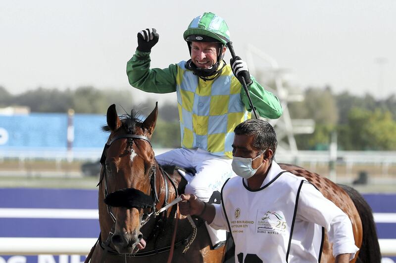 DUBAI , UNITED ARAB EMIRATES , MARCH 27  – 2021 :-  SECRET AMBITION  (GB) ridden by Tadhg O’Shea ( no 12   ) won the 2nd horse race Godolphin Mile 1600m Dirt during the Dubai World Cup held at Meydan Racecourse in Dubai. ( Pawan Singh / The National ) For News/Sports/Instagram/Big Picture. Story by Amith