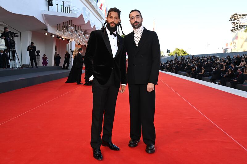 Saudi actor Rawkan Binbella, left, with Saudi film producer Mohammed Al Turki. Getty Images