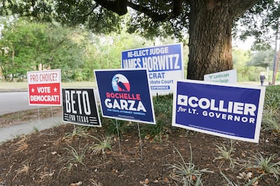 Campaign signs are posted before the midterm elections in Houston, Texas. AFP