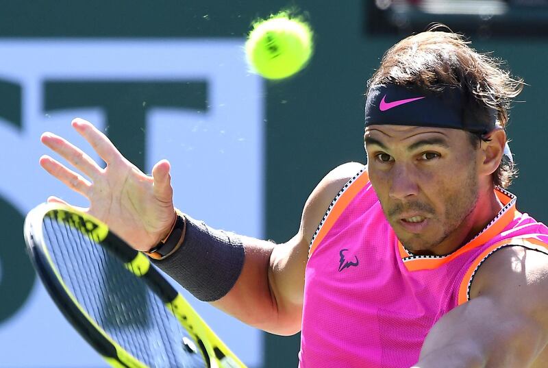 Mar 15, 2019; Indian Wells, CA, USA; Rafael Nadal (ESP) returns as he wins his semi final match against Karen Khachanov (not pictured) in the BNP Paribas Open at the Indian Wells Tennis Garden. Mandatory Credit: Jayne Kamin-Oncea-USA TODAY Sports