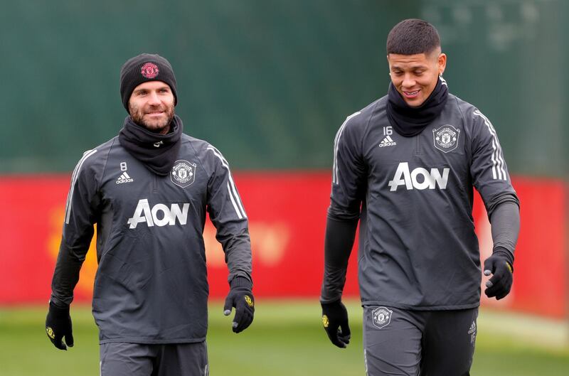 Manchester United's Juan Mata (left) and Marcos Rojo during the training session at the AON Training Complex, Manchester. PA Photo. Picture date: Wednesday December 11, 2019. See PA story SOCCER Man Utd. Photo credit should read: Richard Sellers/PA Wire