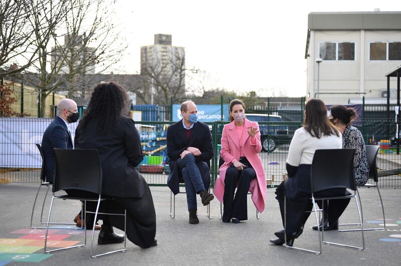 Prince William and Catherine, Duchess of Cambridge, hold a discussion with teachers. AFP