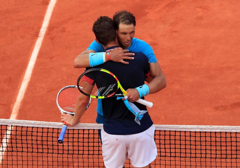 Spain's Rafael Nadal embraces Austria's Dominic Thiem after winning their final. Gonzalo Fuentes / Reuters