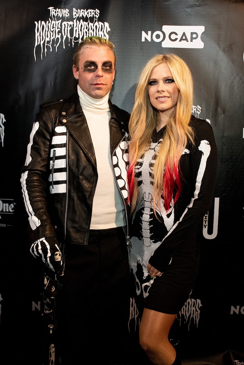 Mod Sun and Avril Lavigne in skeleton suits