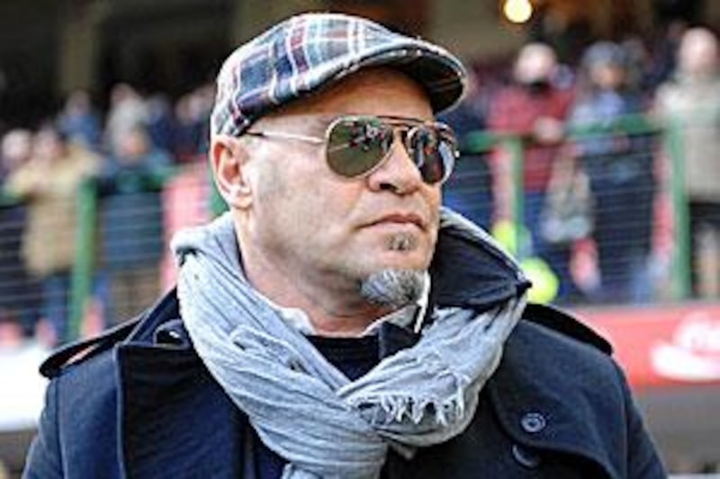 Serse Cosmi, the Livorno coach, looks on during his team's  Serie A draw with AC Milan.