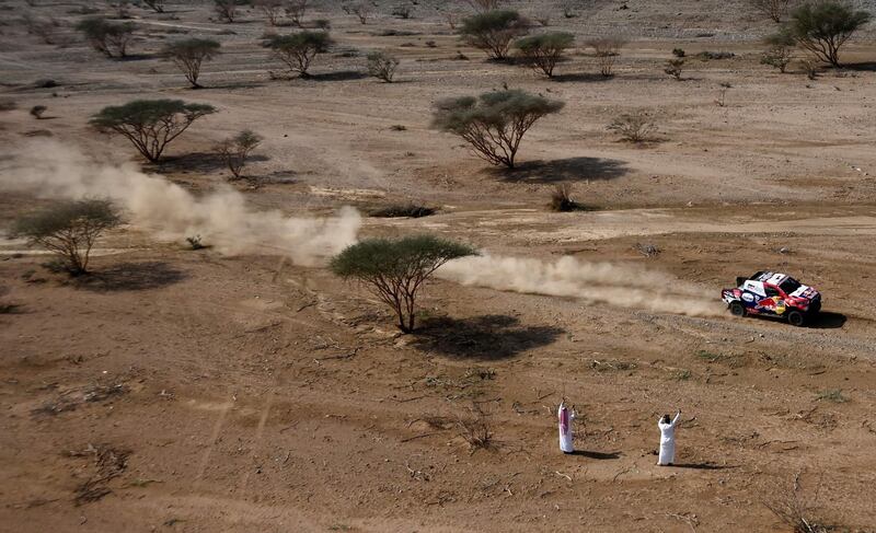 Toyota's driver Nasser Al-Attiyah of Qatar and his co-driver Mathieu Baumel of France compete during the prologue near the Saudi city of Jeddah, on the eve of the 2021 Dakar Rally. AFP
