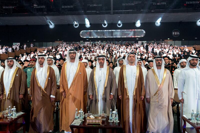 ABU DHABI, UNITED ARAB EMIRATES - October 07, 2018: (L-R) HH Sheikh Sultan bin Mohamed bin Khaled Al Nahyan, HH Sheikh Khalifa bin Mohamed bin Khaled Al Nahyan, HE Dr Sultan Ahmed Al Jaber, UAE Minister of State, Chairman of Masdar and CEO of ADNOC Group, HH Sheikh Hamed bin Zayed Al Nahyan, Chairman of the Crown Prince Court of Abu Dhabi and Abu Dhabi Executive Council Member, Dr. Arif Sultan Al Hammadi, Executive Vice President of Khalifa University and HE Hussain Ibrahim Al Hammadi, UAE Minister of Education, stand for the UAE National Anthem during the 2018 Khalifa University Graduation ceremony at the Abu Dhabi National Exhibition Centre (ADNEC).

( Rashed Al Mansoori / Crown Prince Court - Abu Dhabi )
---