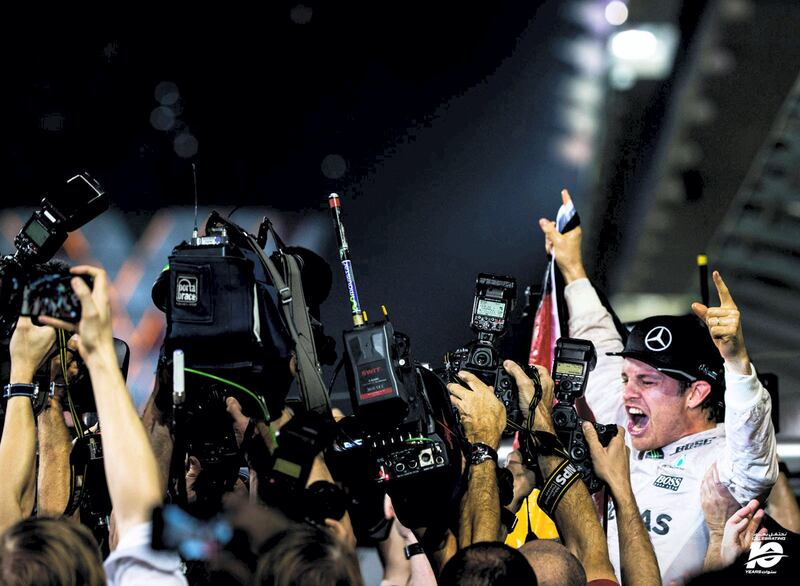 Turning on my heels and running away from the throng of photographers snapping the new drivers’ world champion may seem like a foolhardy choice. Prior to Nico Rosberg being hoisted high by his mechanics I decided to get the shot you see here. The feeling of elation I get when a shot comes together in the viewfinder makes all the effort worthwhile. Shot ‘in-the-can’ I turned away and punched the air every bit as hard as the celebrating Mercedes driver!