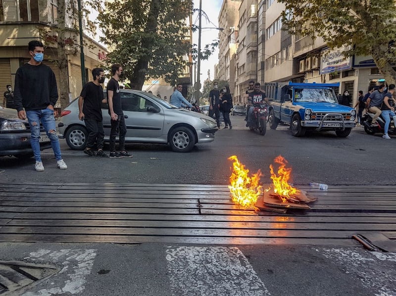 Protesters take to the streets of Tehran. EPA