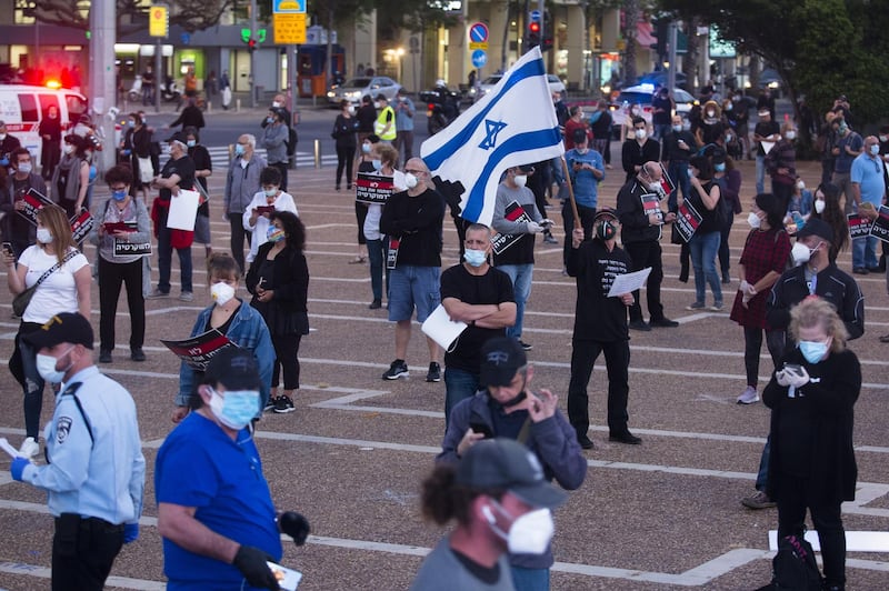 Israelis protest at a rally in Rabin Square on April 19, 2020 in Tel Aviv, Israel.  Getty Images