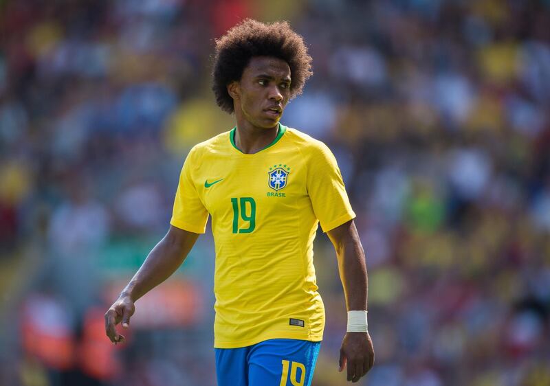 10 Brazil ||
The look: Brazil have finally paired their famous yellow shirts with a lighter shade of blue for their shorts. The difference is subtle, but they look more like the 80s Brazil. ||
Would I wear it? No, not both together. ||
Photo: Peter Powell / EPA