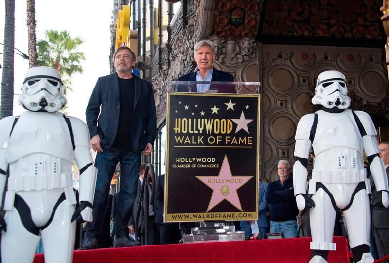 Actors Mark Hamill, second from left, and Harrison Ford attend a ceremony honoring Hamill with a star on the Hollywood Walk of Fame on March 8, 2018, in Hollywood, California. AFP