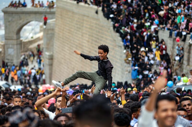 Yemenis gather at the historic 12th century citadel of al-Qahira in Yemen's third city of Taez, during the celebrations of the Muslim holiday of Eid al-Adha.