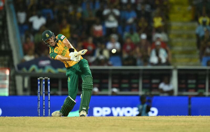 South Africa's Marco Jansen hits the winning six that to seal a three-wicket win over West Indies and with it a place in the T20 World Cup semi-finals. AFP