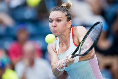 (FILE) - Simona Halep of Romania hits a return to Daria Snigur of Ukraine during their first round match at the US Open Tennis Championships at the USTA National Tennis Center in the Flushing Meadows, New York, USA, 29 August 2022 (reissued 21 October 2022).  The International Tennis Integrity Agency on 21 October 2022 in a statement announced that Halep has been provisionally suspended for violating an anti-doping rule.  The B sample taken during the 2022 US Open confirmed the finding of anti-anaemia drug Roxadustat in the A sample.  Halep denies knowingly taken a prohibited substance.   EPA / JUSTIN LANE *** Local Caption *** 57888350