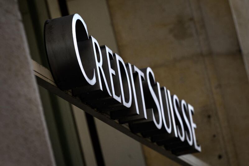 (FILES) This file photograph taken on April 6, 2021, shows a sign of Swiss banking Credit Suisse on a branch in Lausanne.  Credit Suisse announced a net loss of $274 million in first quarter on April 22, 2021. / AFP / FABRICE COFFRINI
