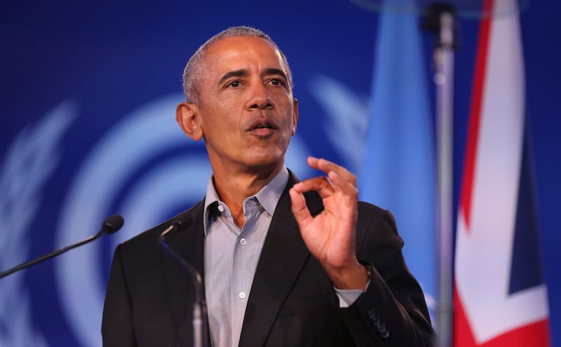 Former US president Barack Obama speaks during the summit. EPA