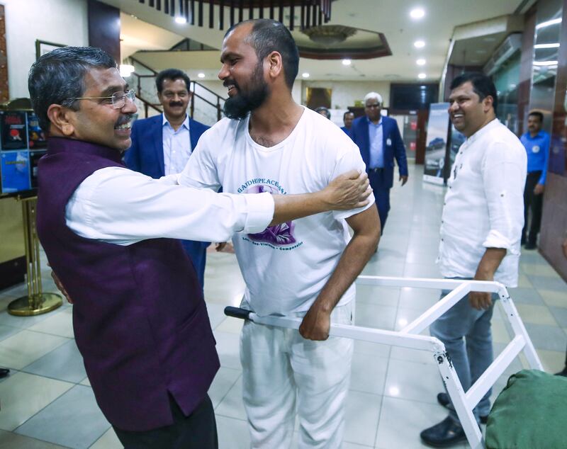 Nitin Sonawane is welcomed by VTV Damodaran, founder of a Gandhi group